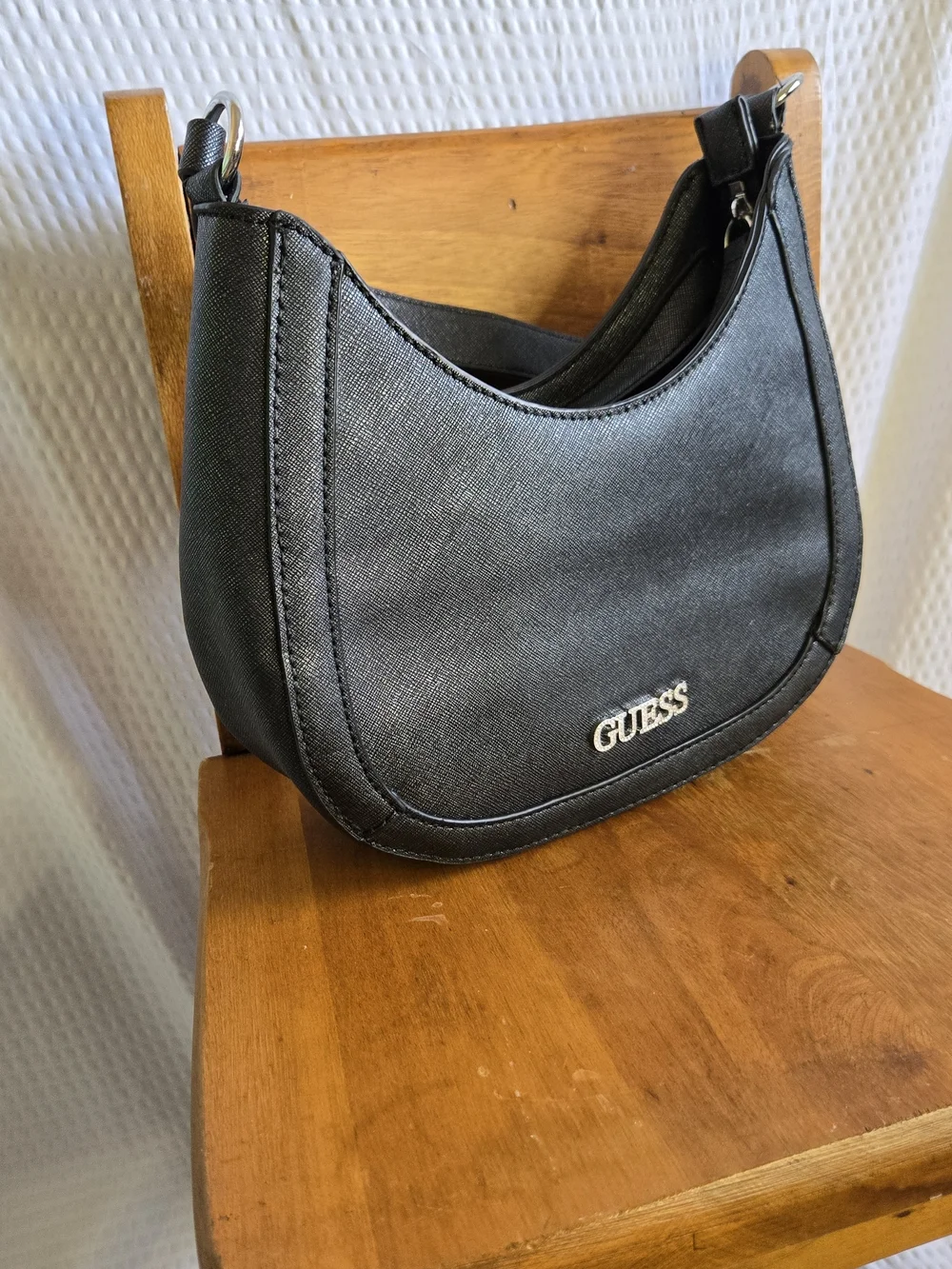 GUESS Black Crescent Shoulder Bag with Gold Logo